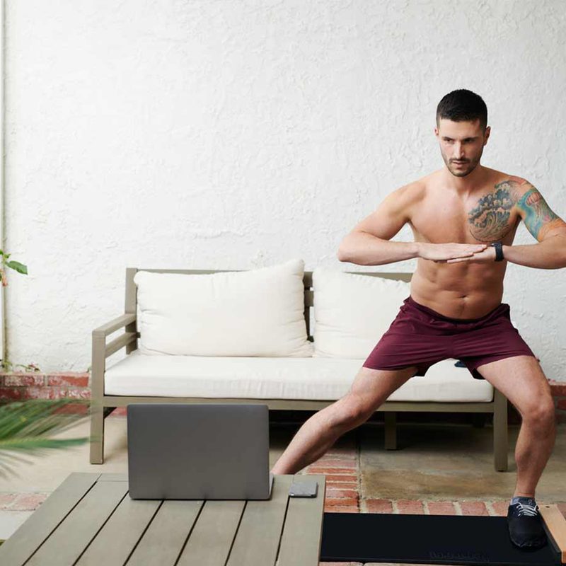 Man using Brrrn board for lateral training.