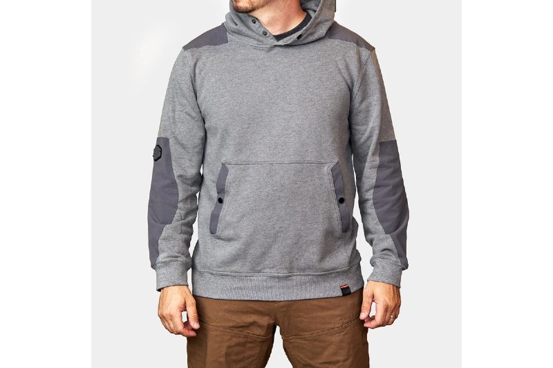 A midsection of a man wearing a gray Brunt Workwear Coady Hoodie.
