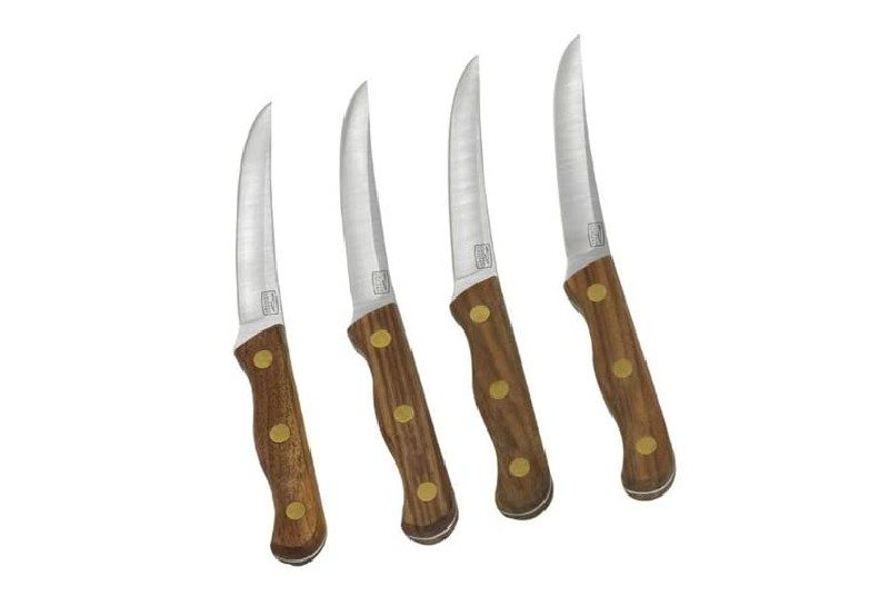 Four Chicago Cutlery steak knives.