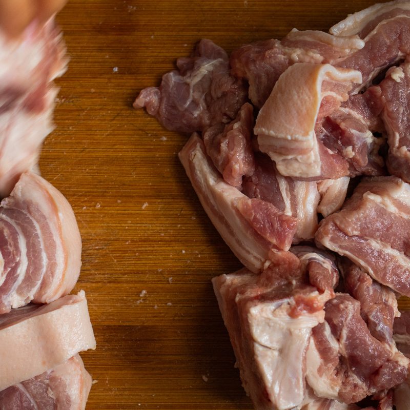 Chunks of pork belly with skin.