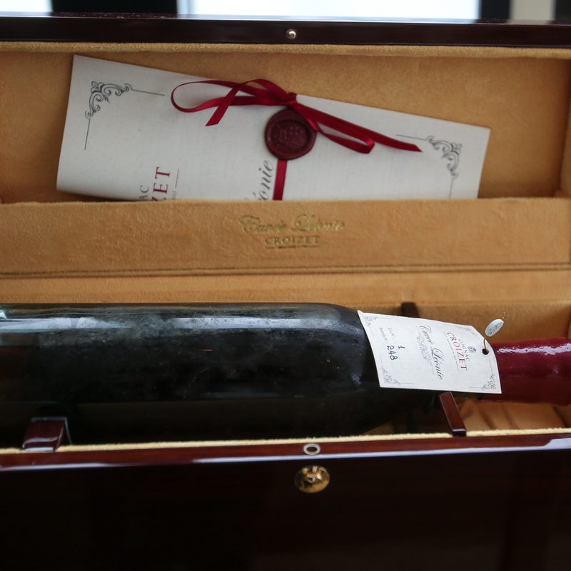 A bottle of Croizet Cognac Leonie 1858 in a case.
