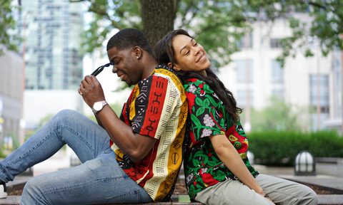 Customers wearing the DIOP Top made from ankara fabric.