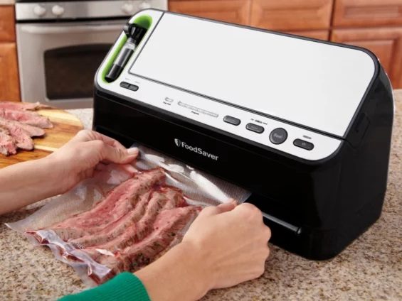 The FoodSaver V4400 2 in 1 Vacuum Sealer in action.