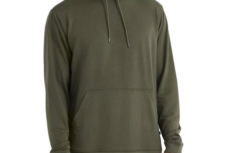 A midsection of a man wearing a Free Fly Apparel Bamboo Fleece Pullover Hoodie.
