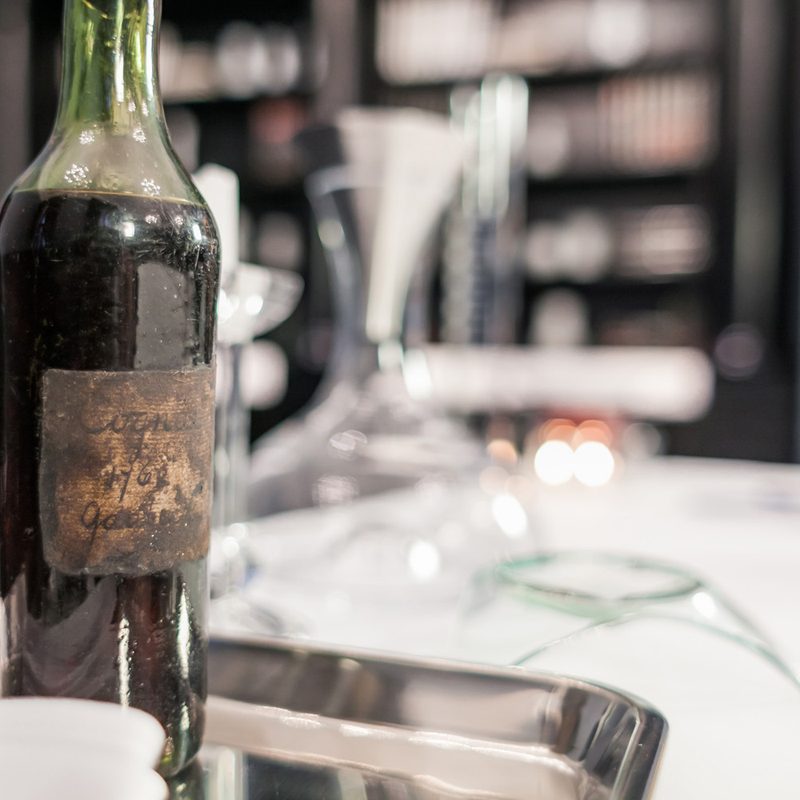 A bottle of Gautier Cognac 1762 on a tray.