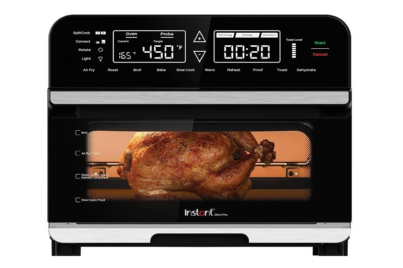 Instant Omni Pro air fryer cooking a chicken.