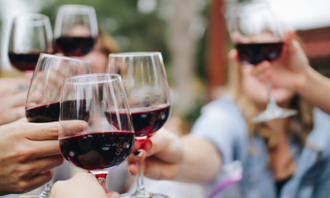 Glasses of red wine.
