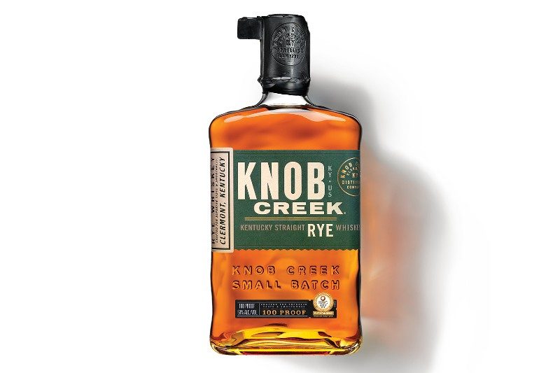 Bottle of knob creek rye whiskey with a white background.