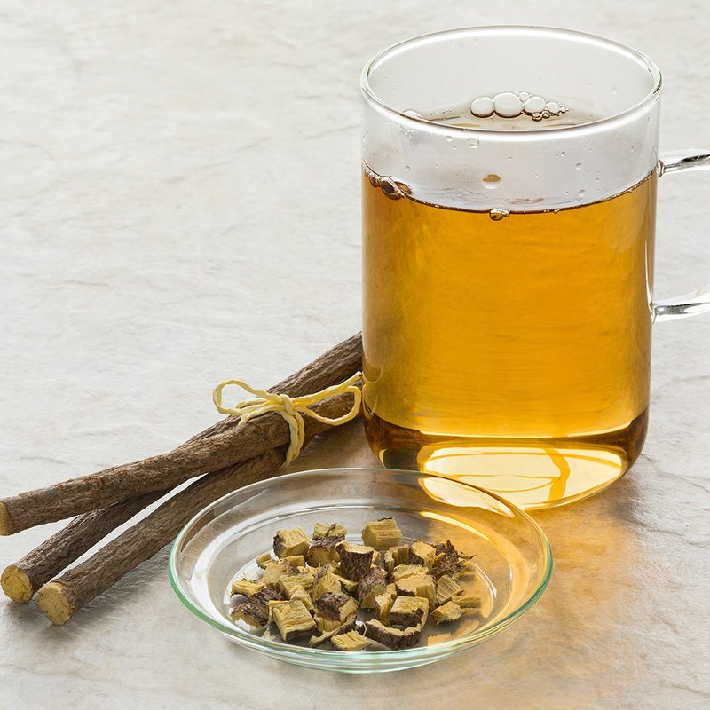 Licorice tea and a heap of roots.