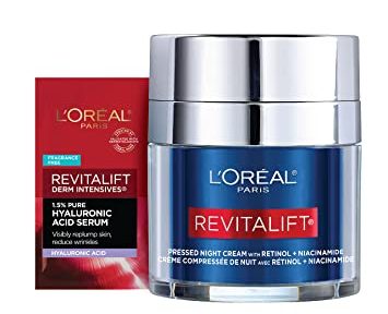 Loreal Paris Revitalift night cream with sample on a white background.