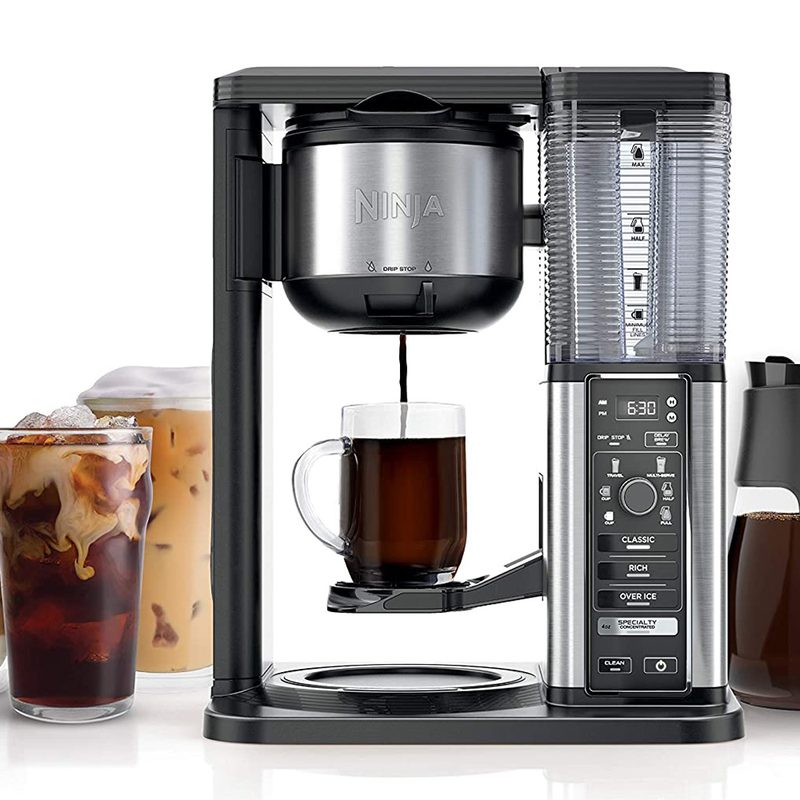 Ninja 10-Cup Coffee Maker with cups of coffee in white background.
