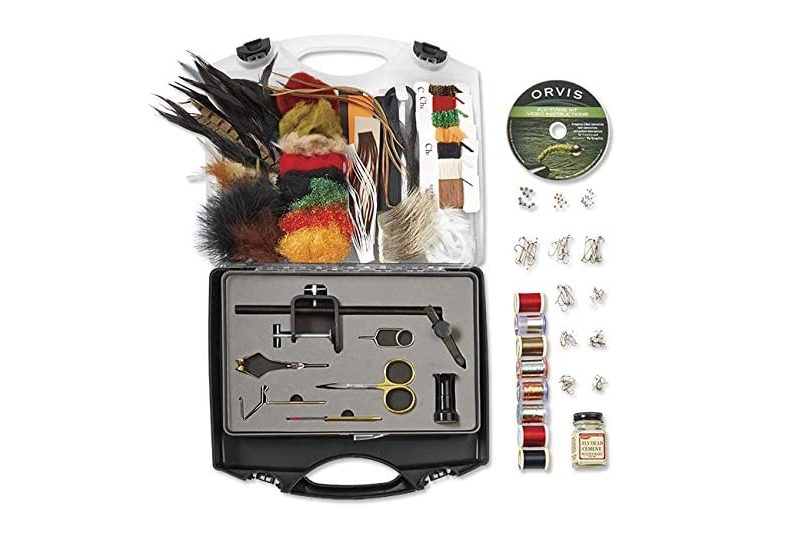 fly tying kit with cd rom, thread, and tools.