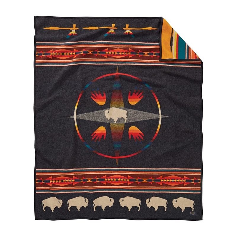 A Pendleton Jacquard Wool Blanket with bison pattern.