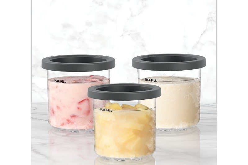 three pints of ice cream ingredients with lids on them.