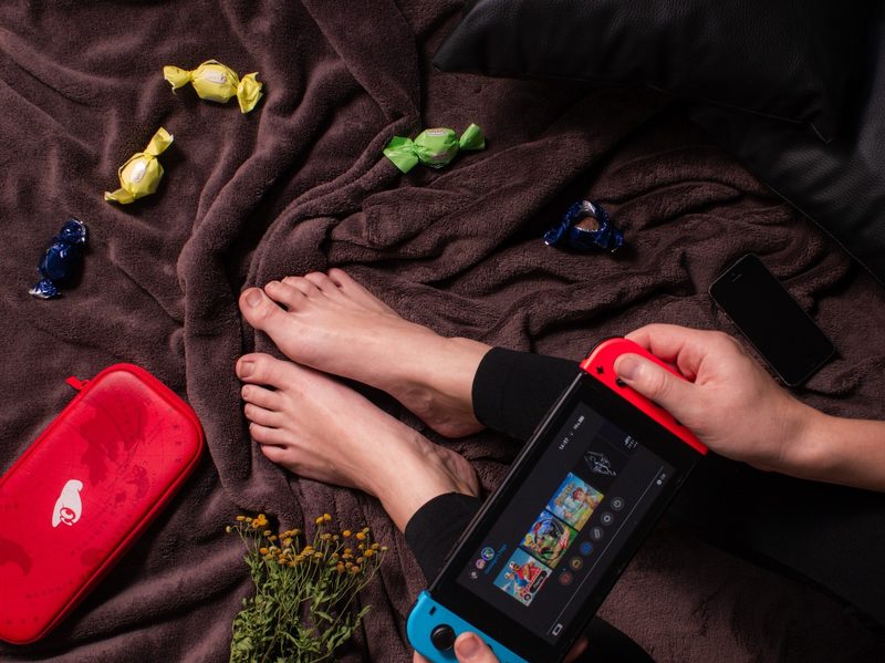 Kicking back and playing some Nintendo Switch in bed.
