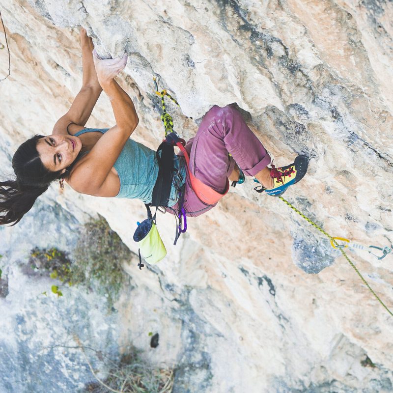 Woman rock climbing