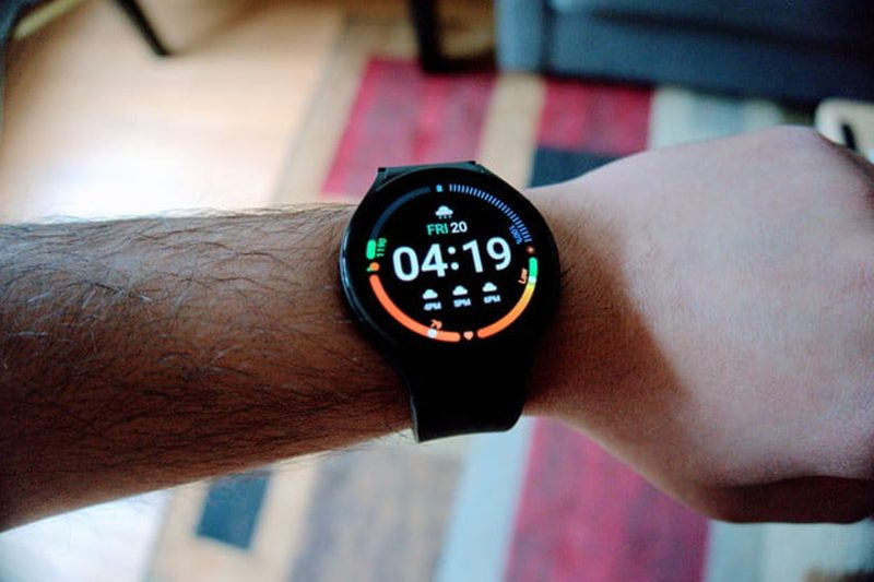 A man wearing the Samsung Galaxy Watch 4.