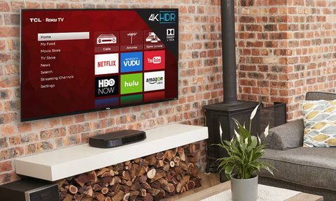 The TCL 4 Series TV on the wall.