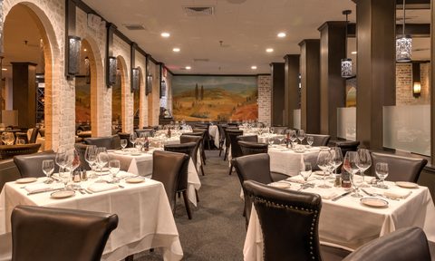 The dining room of Tuscany Steakhouse in NYC.
