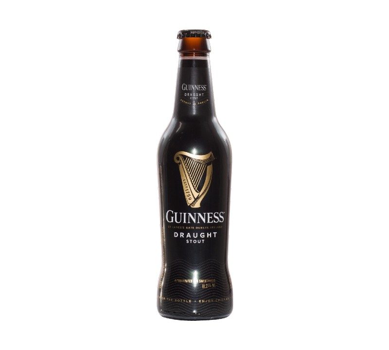 bottle of Guinness beer against a white background.