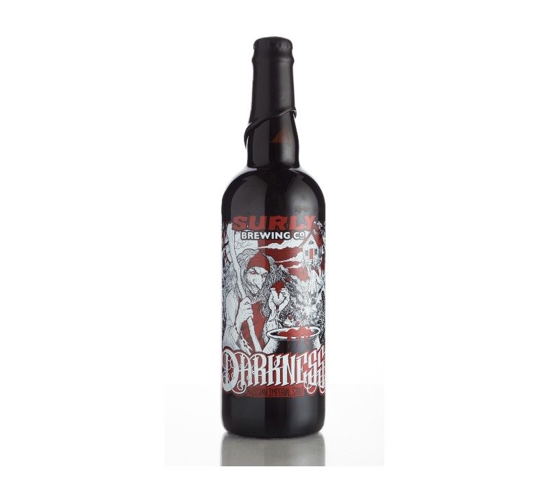 bottle of Surly Darkness beer against a white background.
