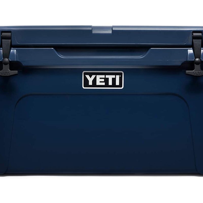 A navy Yeti Tundra 65 on plain background.