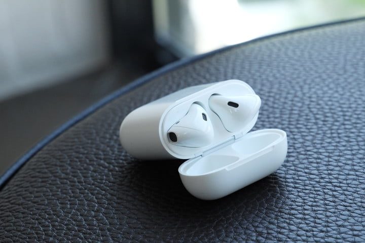 The Apple AirPods 2 in their charging case.