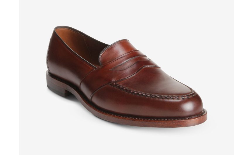 Stylish leather loafers for men - Tan colored Allen Edmonds Randolph model on a light gray background.