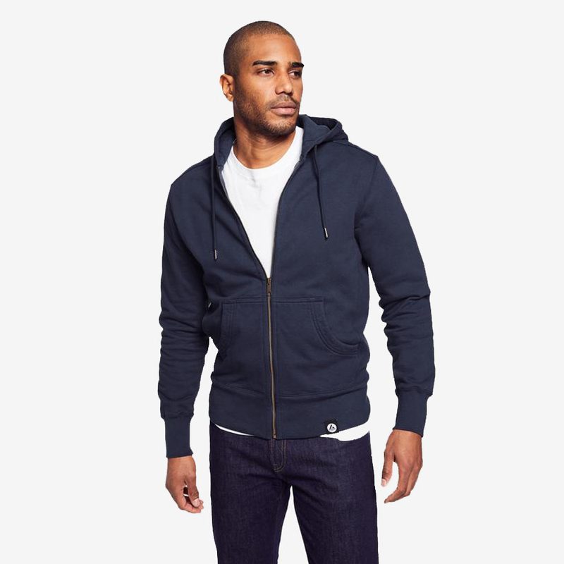 A man wearing an American Giant Classic Full Zip.
