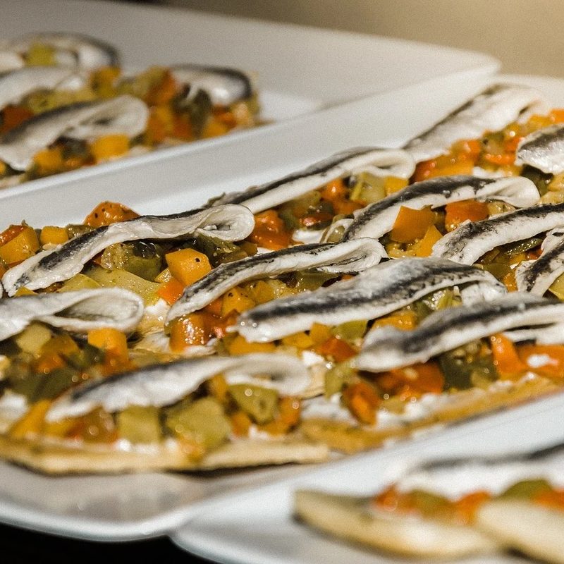 Anchovies on flatbread.