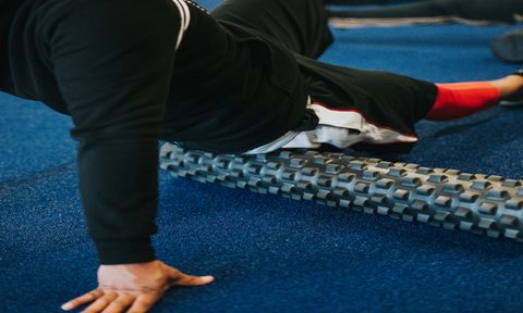 Foam rolling legs.
