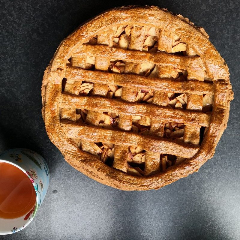 Apple Pie and a cup of tea on the table.