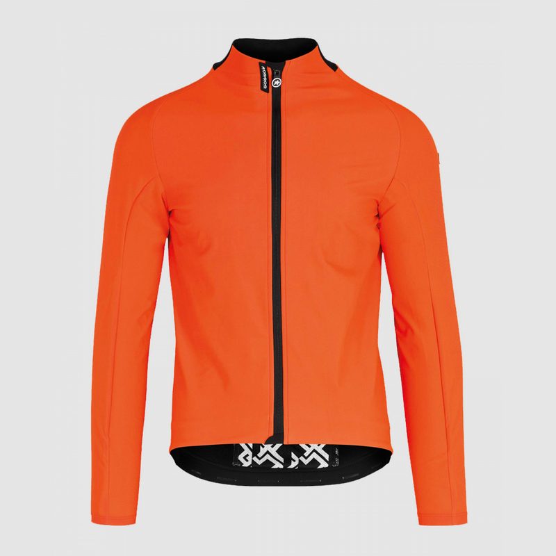 A bright orange Assos Mille GT Ultraz Winter Jacket EVO on gray background.
