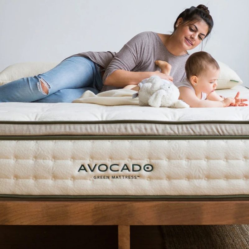 Avocado Green Mattress with mom and baby on the bed.