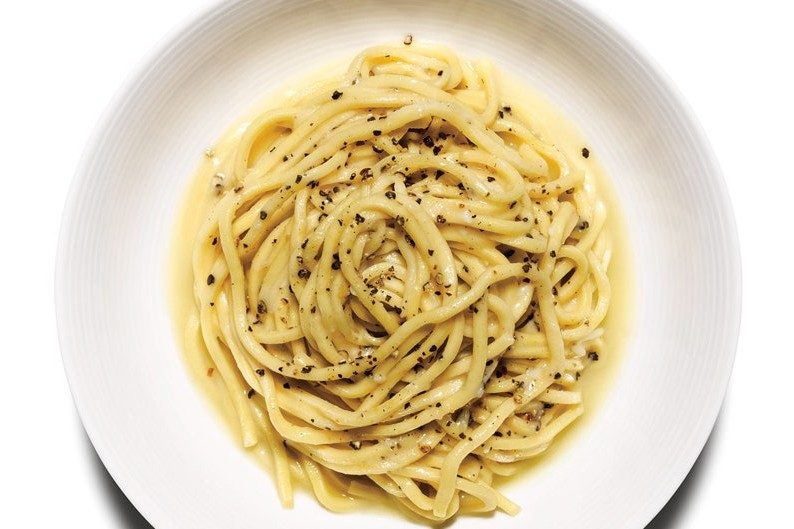 Cacio e Pepe pasta on a white plate