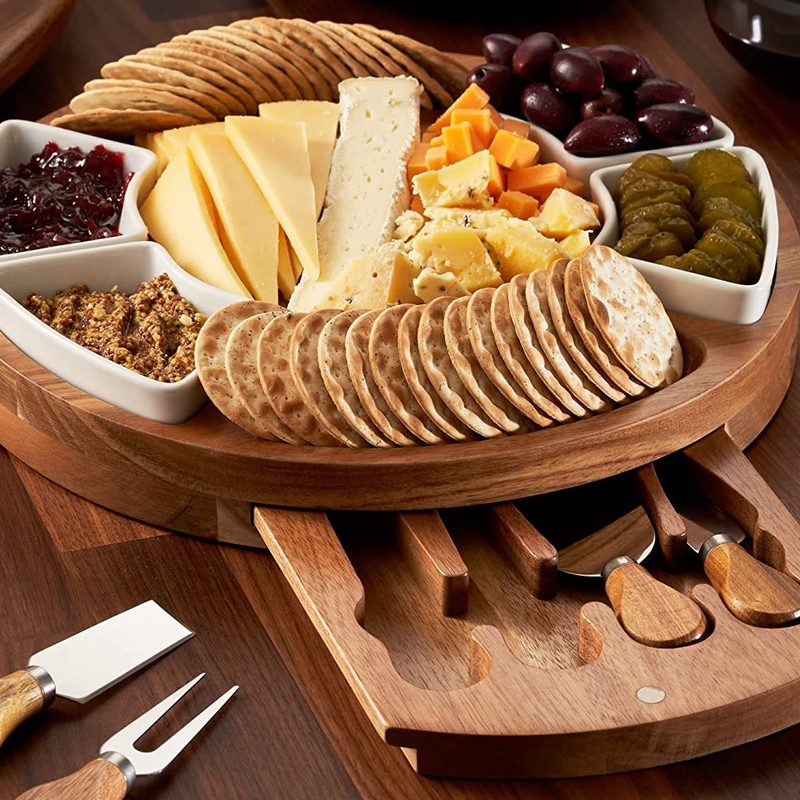 Charcuterie Board Set with food and utensils for parties.