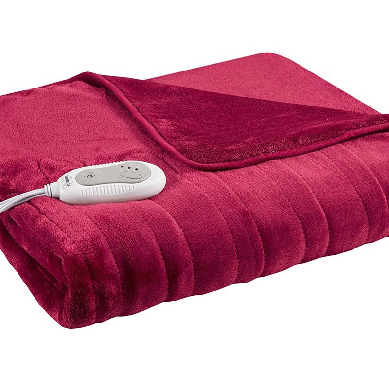 A plush Degrees of Comfort Heated Blanket with Foot Pocket on white background.