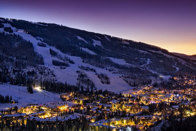 A view of a village in Vail at dusk.