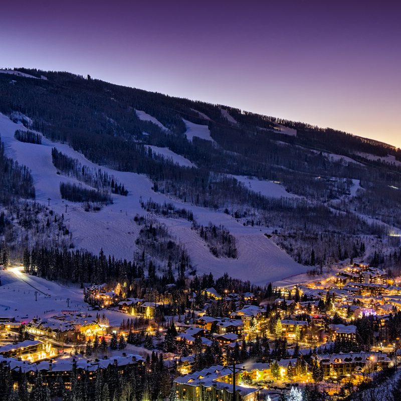 A view of a village in Vail at dusk.