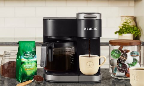 Keurig K-Duo Single Serve K-Cup Pod & Carafe Coffee Maker on a counter with coffee.