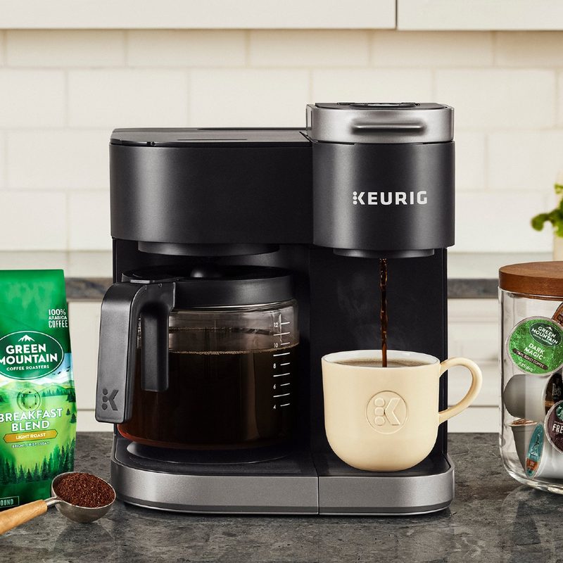 Keurig K-Duo Single Serve K-Cup Pod and Carafe Coffee Maker on a counter with coffee.