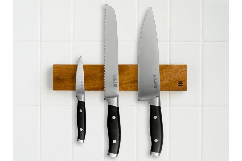 Kilne's three piece knife set on a wall.