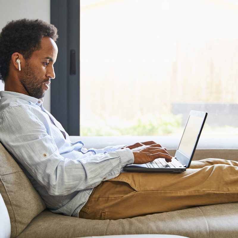 Man sitting at home working