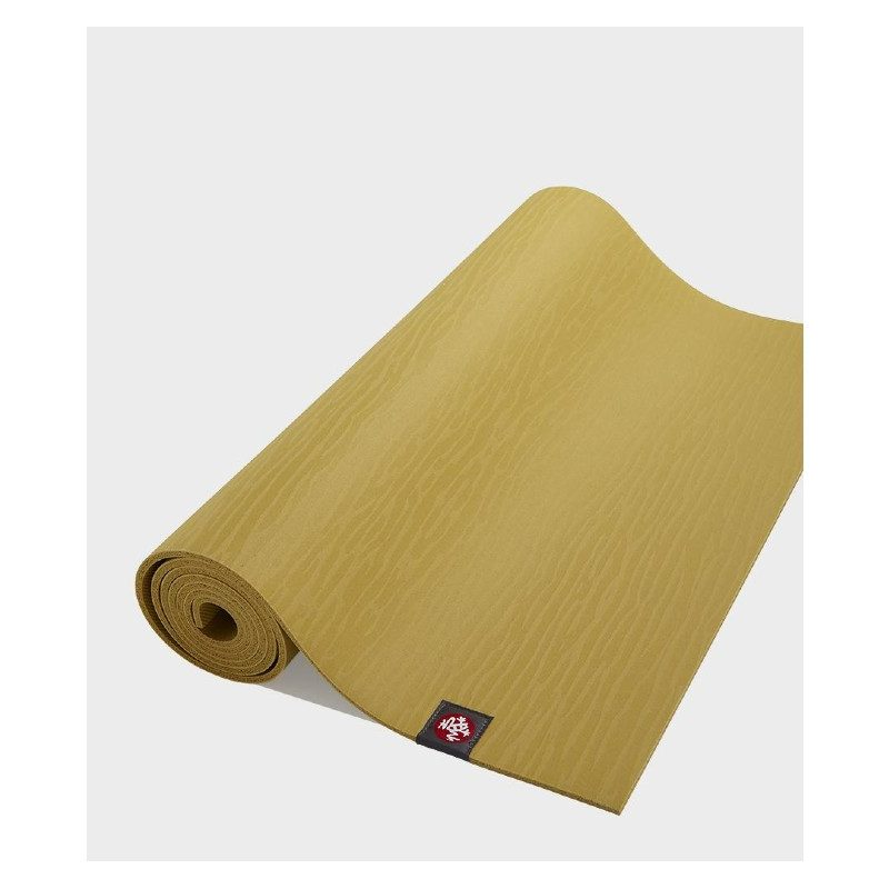 Manduka EKO Yoga Mat being unrolled.