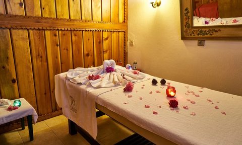 Massage table with flowers.