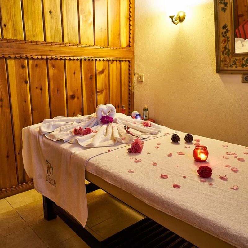 Massage table with flowers.