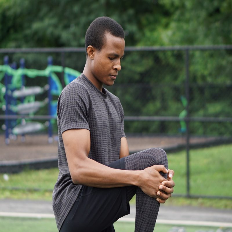 Man stretching glutes