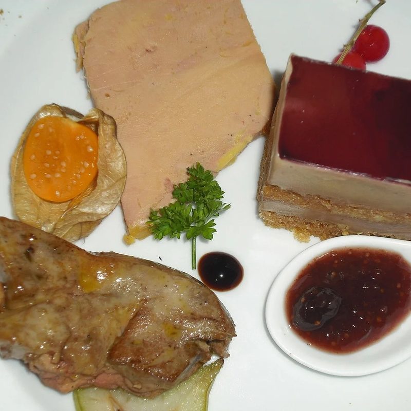 Liver and offal meat on a plate.