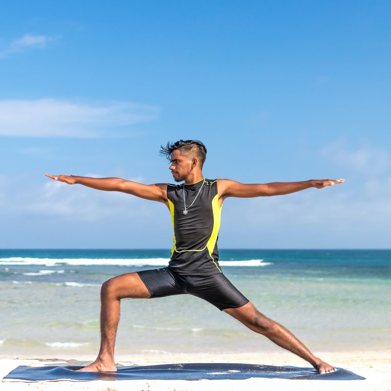 Man doing warrior pose.