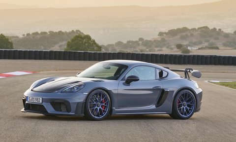 Porsche 718 Cayman GT4 RS front end angle from driver's side on track.